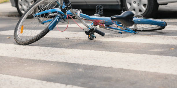 Blue bike on a pedestrian crossing after fatal incident with a car