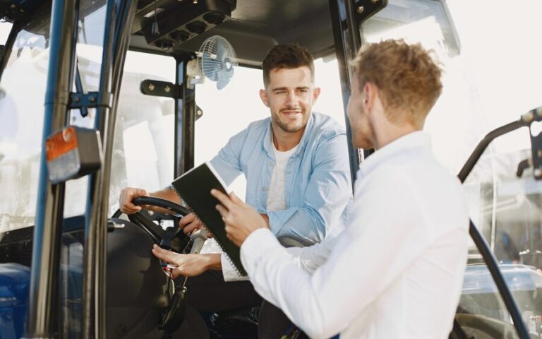 agronomist-choosing-new-planter-man-outdoor-ground-shop-agricultural-machinery_1157-43621